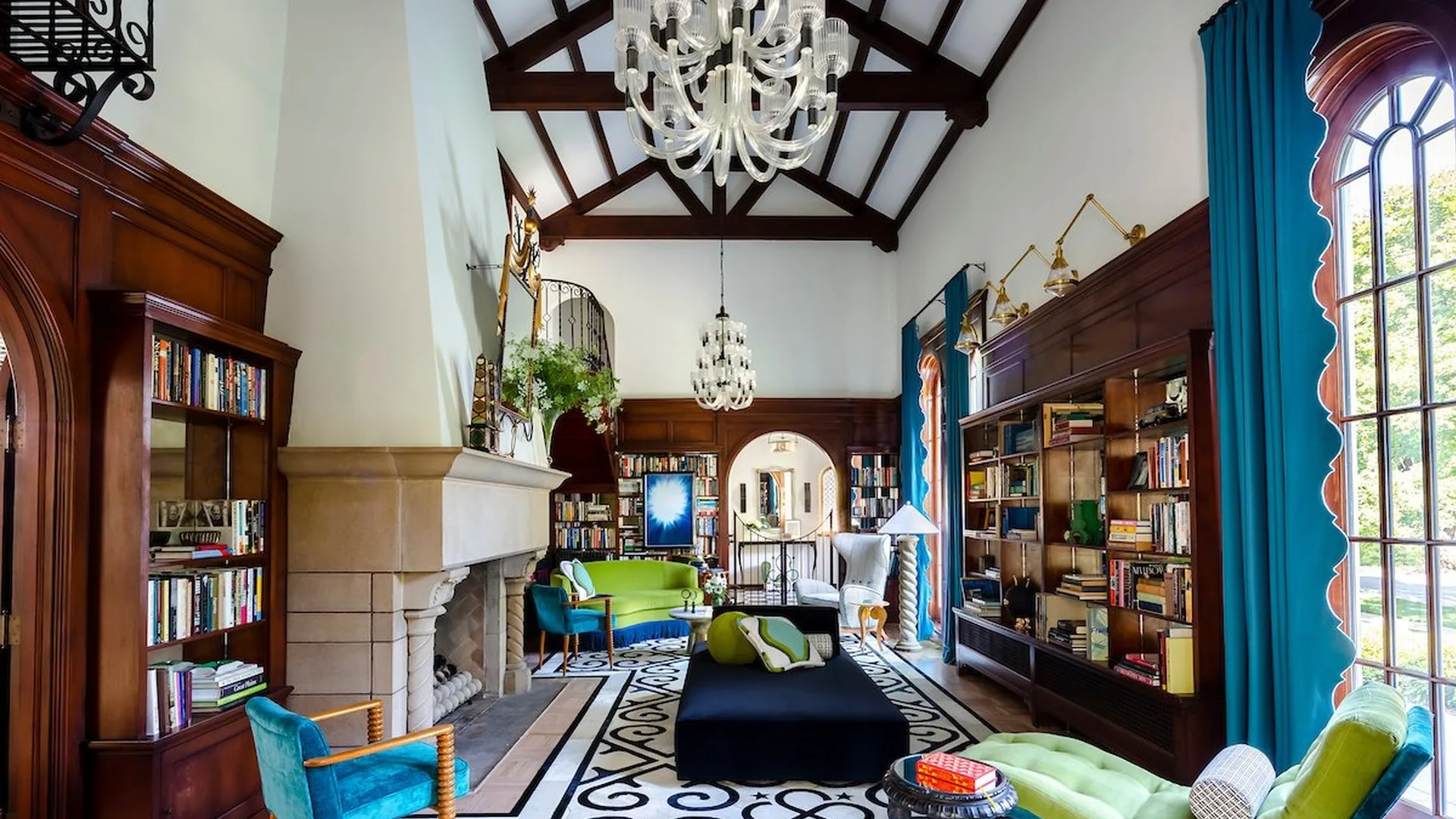 Luxury layered library interior by Studio Eckström, Omaha Nebraska, with custom millwork, curated antiques, and editorial styling