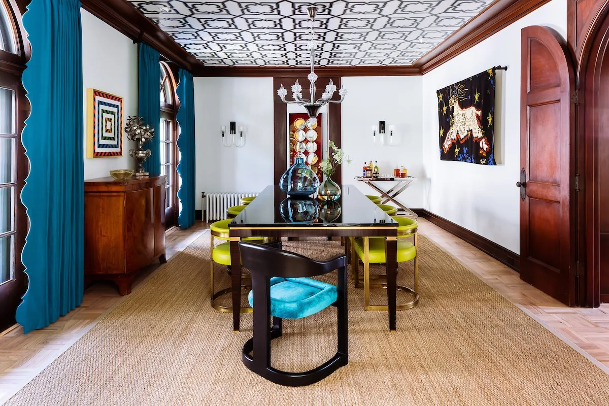 Happy Hollow dining room, patterned black and white ceiling, Murano chandelier, black lacquer table, chartreuse leather chairs, and teal scalloped curtains. Studio Eckström