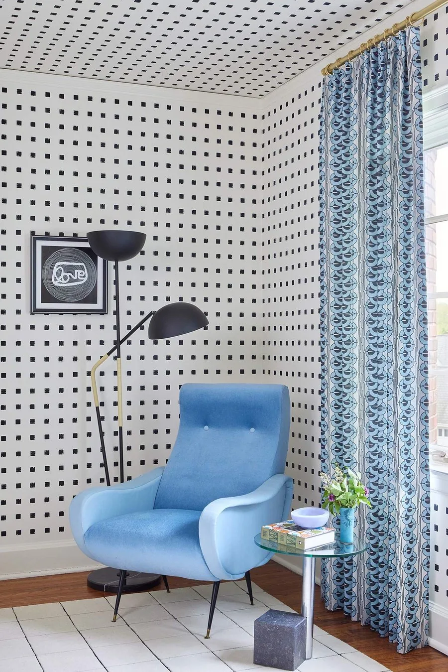 The Werkstaate Room, periwinkle Italian lounge chair, black sculptural floor lamp, patterned drapes, and grid dot wallpaper. The Dundee Remodel, Studio Eckström Omaha