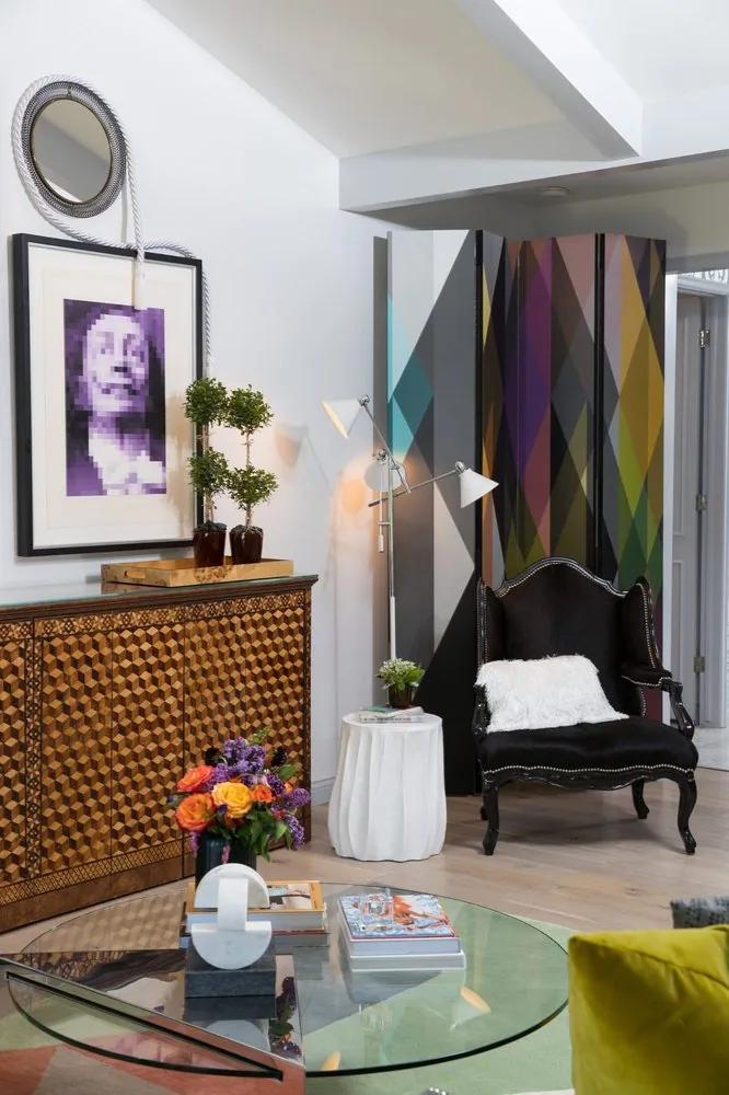 The Regency Refresh living room, inlaid cube-pattern credenza, purple pixel portrait, rope-frame mirror, diamond folding screen, and black velvet Louis XV chair. Studio Eckström Omaha