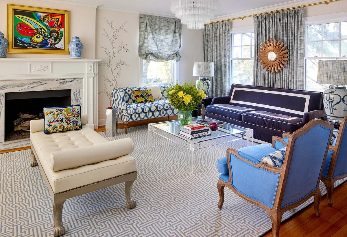 Full-service luxury residential interior design by Studio Eckström, Omaha Nebraska, layered salon with curated furniture, art, and custom millwork